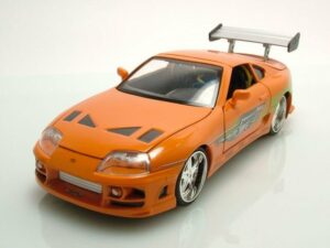 JADA Modellauto Toyota Supra 1995 orange Fast & Furious mit Brian Figur Modellauto