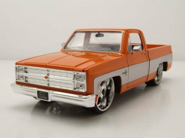 JADA Modellauto Chevrolet C-10 Pick Up 1985 orange grau Modellauto 1:24 Jada Toys