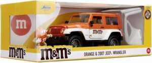 JADA Modellauto Modellauto H.R.M&Ms Orange 2007 Jeep Wrangler mit Figur 1:24 253255068